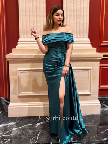Off shoulder drape gown