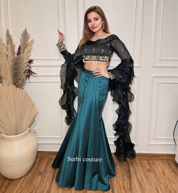 Structured Skirt Paired With A Hand Embroidered Blouse And Ruffle Dupatta