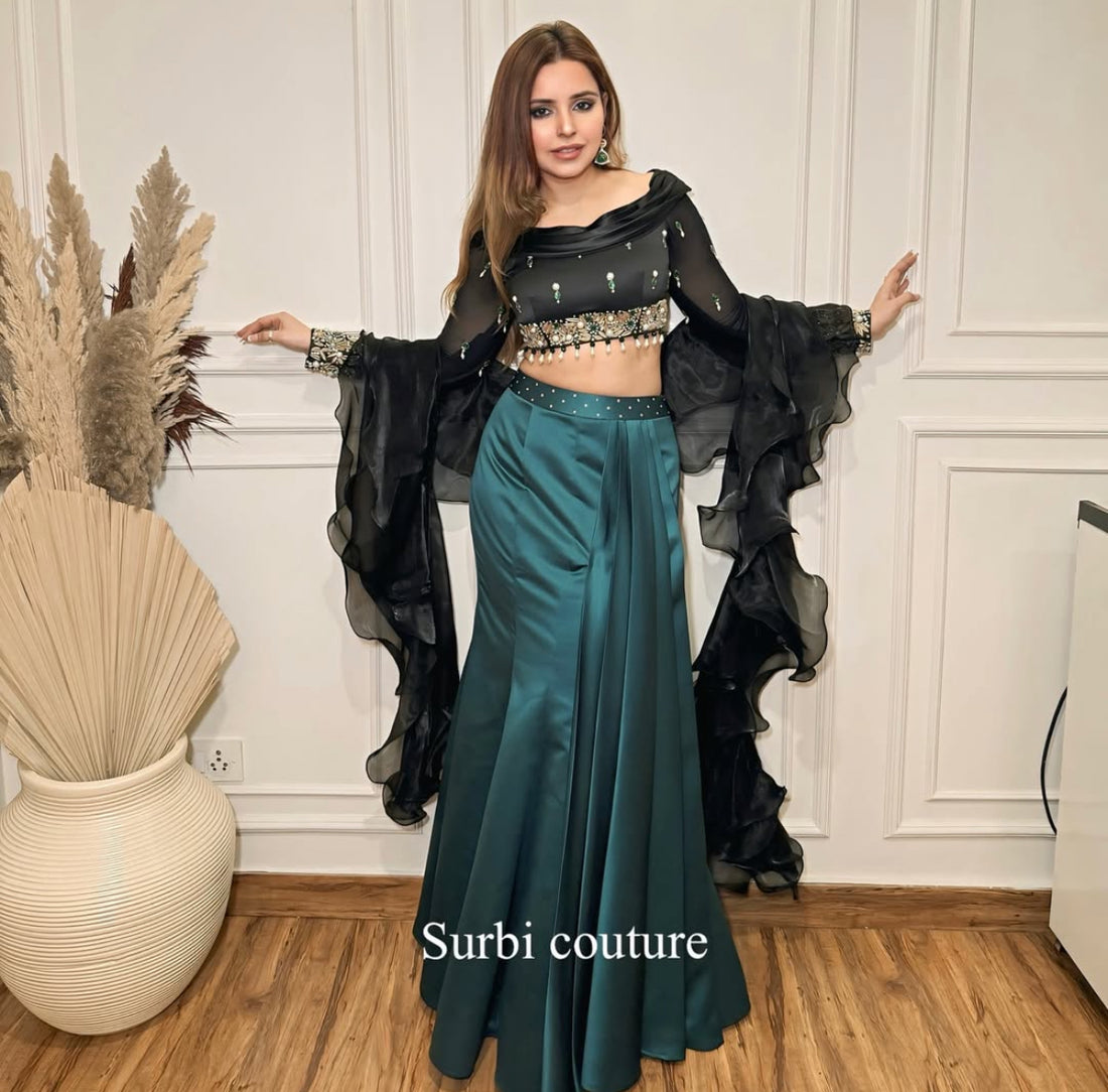 Structured Skirt Paired With A Hand Embroidered Blouse And Ruffle Dupatta