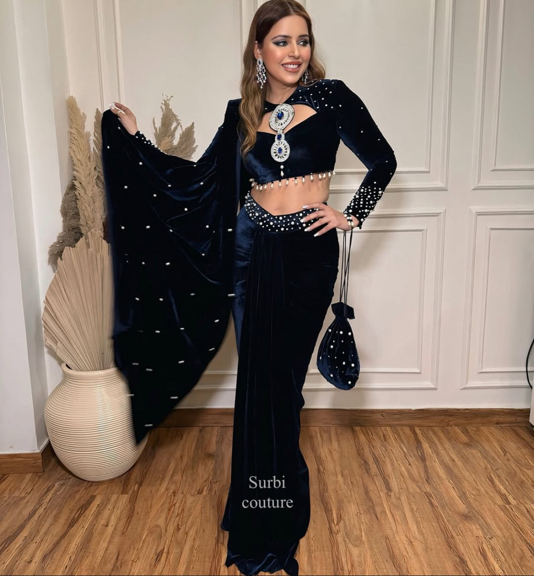 Hand Embroidered Blouse Paired With A Pre Draped Saree