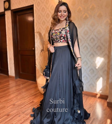 Hand Embroidered Blouse And Cape Paired With A Lehenga