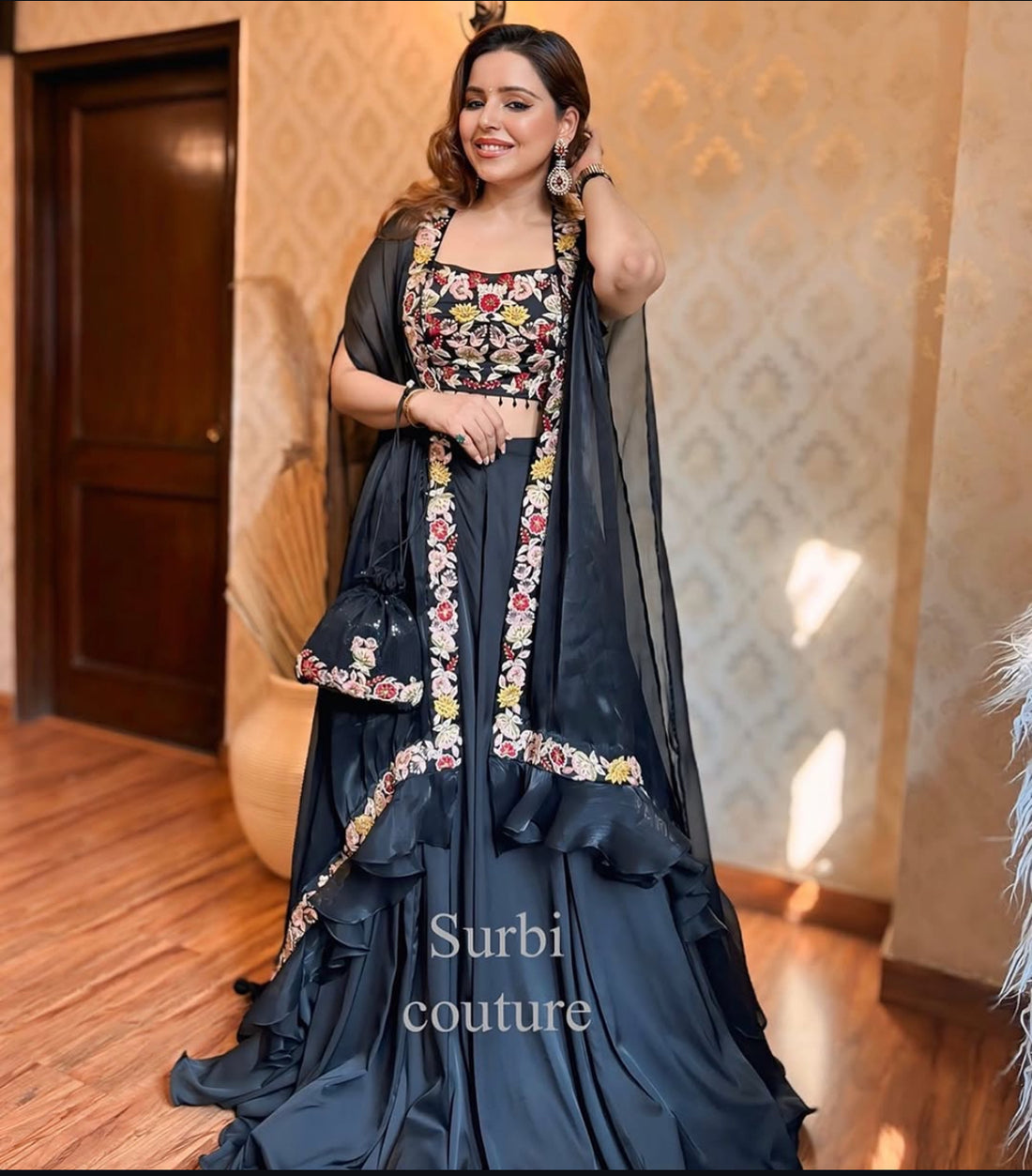 Hand Embroidered Blouse And Cape Paired With A Lehenga
